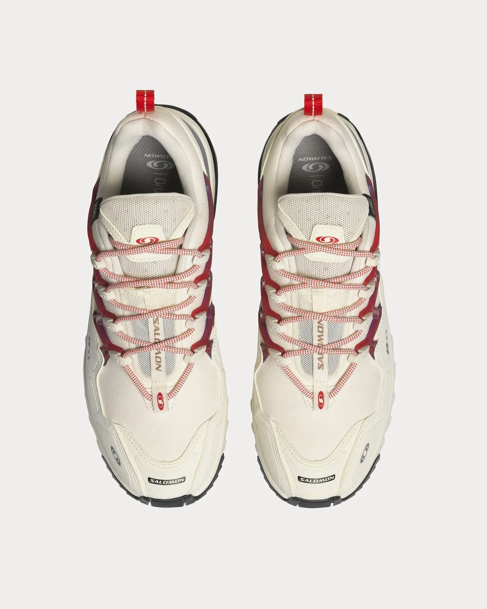 ACS   Climasalomon Vanilla Ice / Quicksilver / High Risk Red Low Top Sneakers